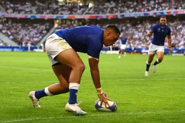 Nigel Ah-Wong of Samoa scores a try to put the ball down