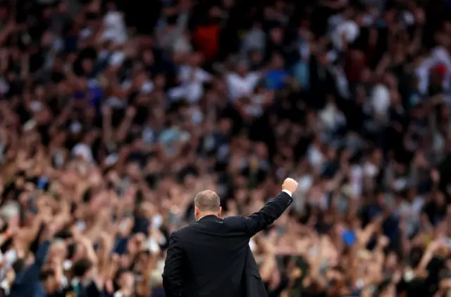 Postecoglou fist pumps the air after Spurs score.