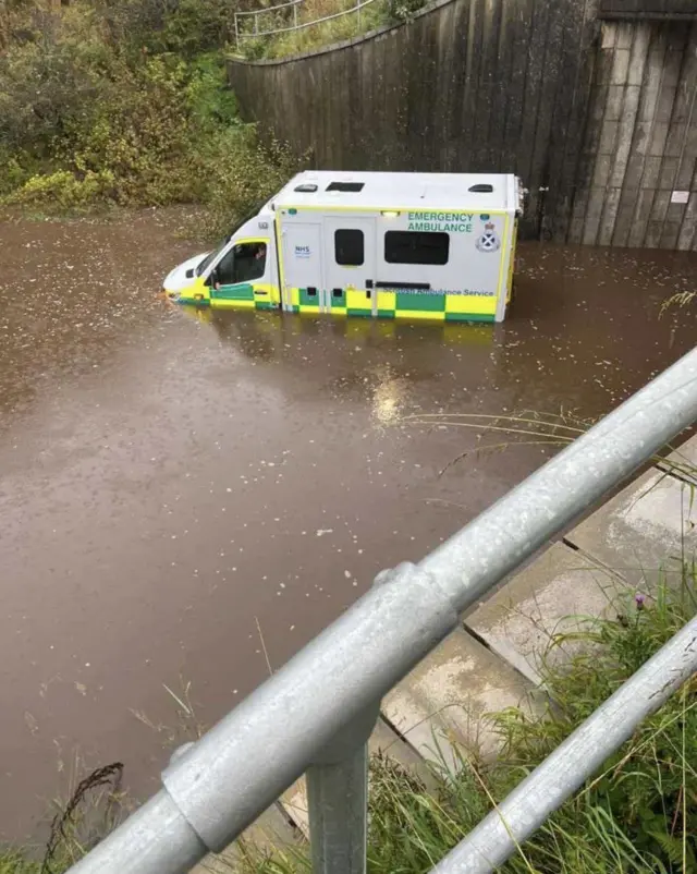 Ambulance stranded in flood water