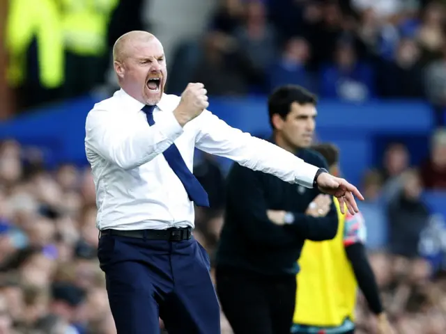 Dyche shakes his fist in elation at the second goal.