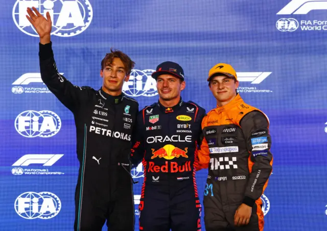 George Russell, Max Verstappen and Oscar Piastri pose for photos after qualifying