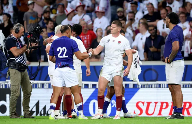 Christian Leali'ifano of Samoa shakes hands with Owen Farrell