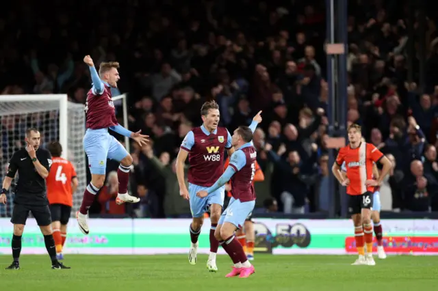 Larsen celebrates scoring a late winner v Luton.