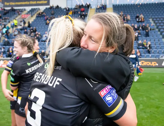 Lindsay Anfield hugs Tamzin Renouf after York booked their Grand Final spot