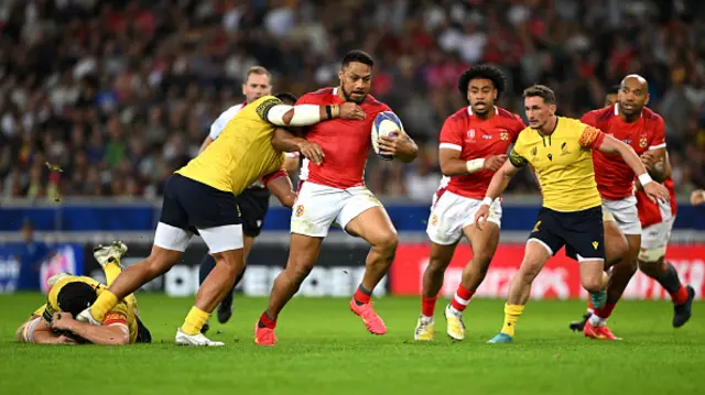 George Moala of Tonga is tackled