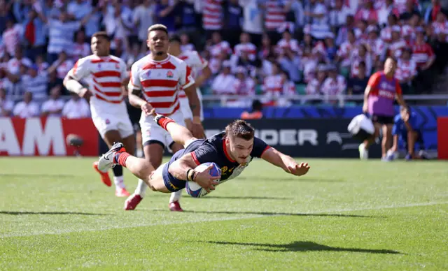 Mateo Carreras dives over the line for a try