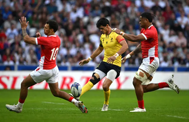 Marius Simionescu of Romania kicks the ball upfield