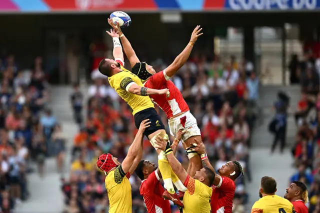 Vlad Neculau of Romania and Adam Coleman of Tonga contest