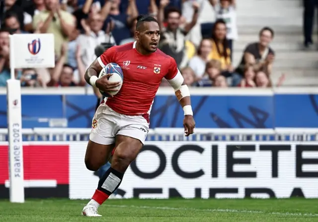 Solomone Kata runs to score a try