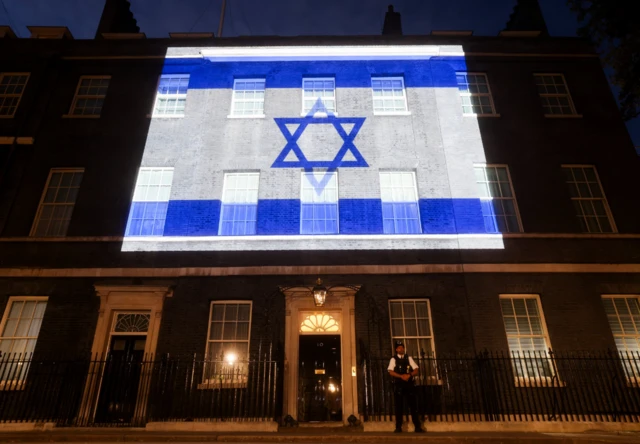 The flag of Israel projected onto Downing Street