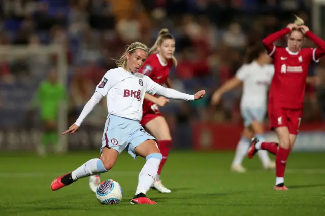 Nobbs looks to cross the ball into the box.