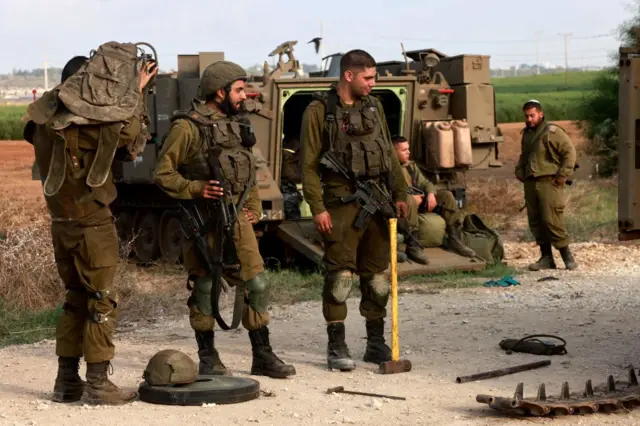 Israeli troops at an undisclosed location close to Gaza