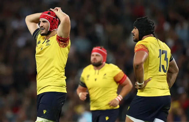 Dejected Romania players during the France game