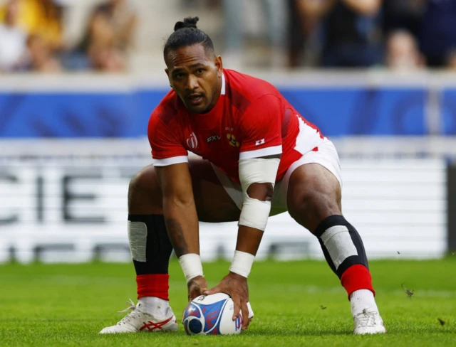 Solomone Kata puts the ball down to score a try