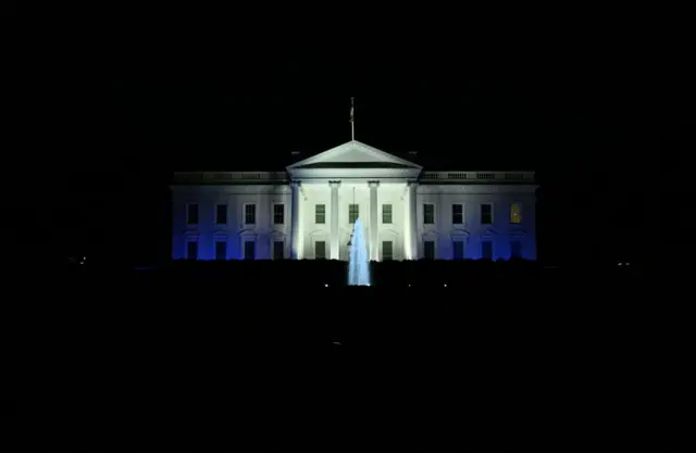 The White House is illuminated in the blue and white colours of the Israeli flag, in Washington, DC