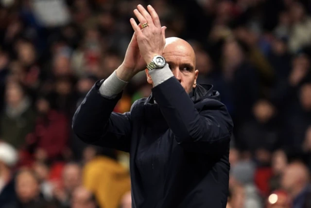 Erik ten Hag applauds the fans