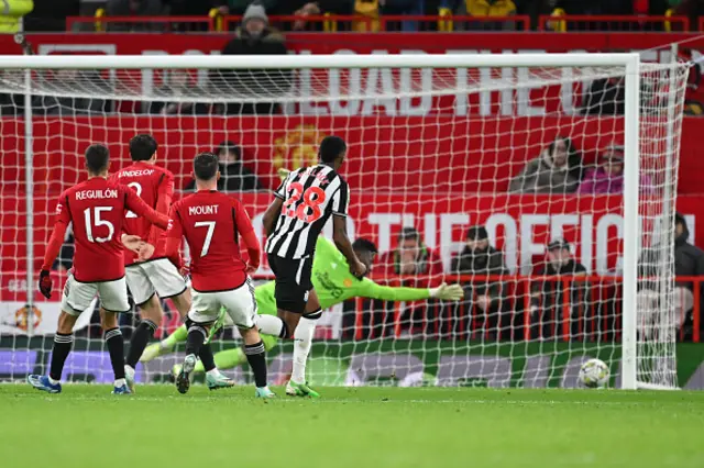 Joe Willock shoots and watches the ball go in