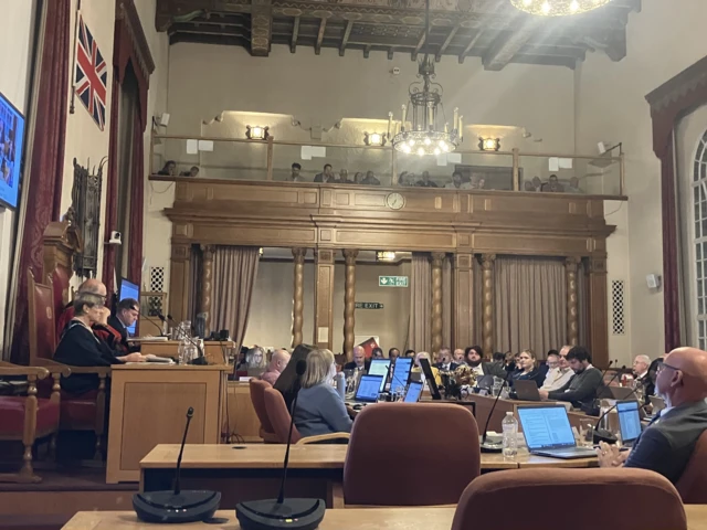 Council chamber and the public gallery above.