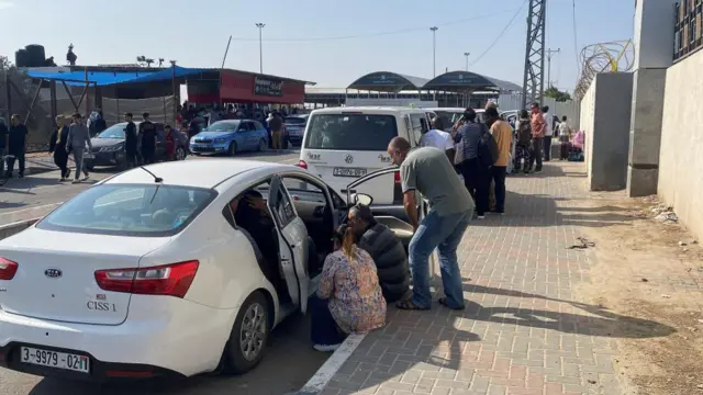 People waiting on the Gazan side of the border this morning