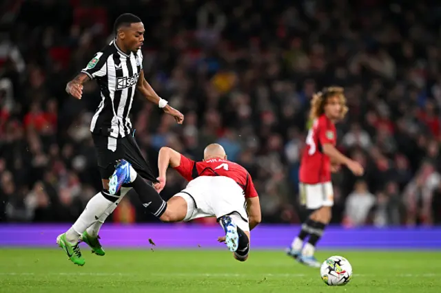 Sofyan Amrabat of Manchester United is fouled by Joe Willock