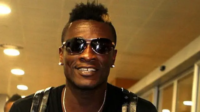 Ghana's striker Asamoah Gyan arrives at Pudong International Airport on July 8, 2015 in Shanghai, China