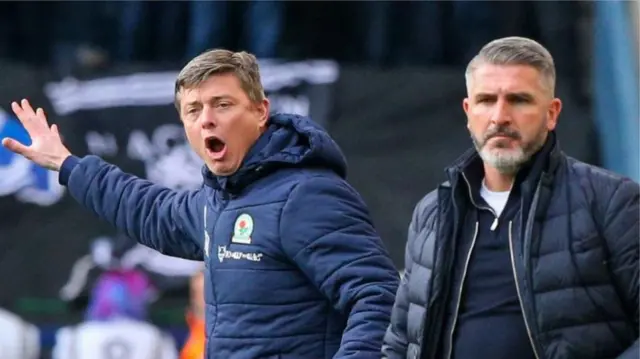 Blackburn boss Jon Dahl Tomasson and Preston manager Ryan Lowe on the touchline