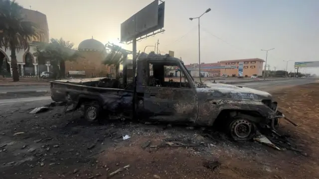 A burned vehicle is seen in Khartoum, Sudan April 26, 2023.