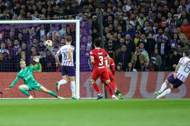 Aron Donnum scores for Toulouse against Liverpool