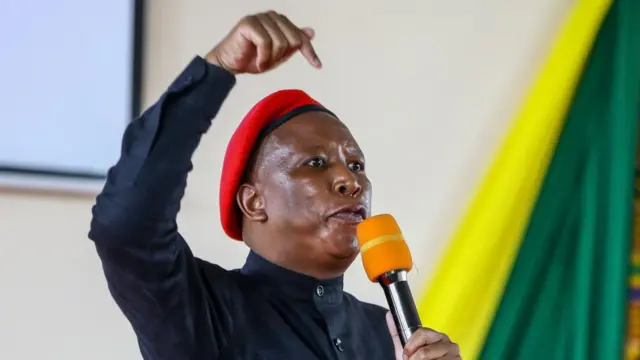 South African leader of the opposition party Economic Freedom Fighters (EFF) Julius Malema (C) speaks during the launch of the Pan African Institute at Lukenya University in Makueni, Kenya, 09 November 2023.