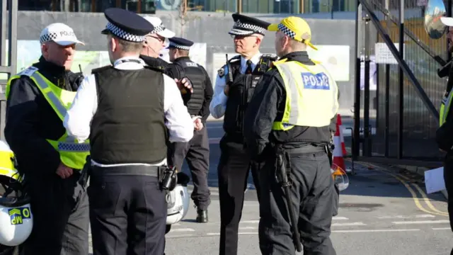 Commissioner Sir Mark Rowley talks to his officers before the arrival of the pro-Palestinian protest
