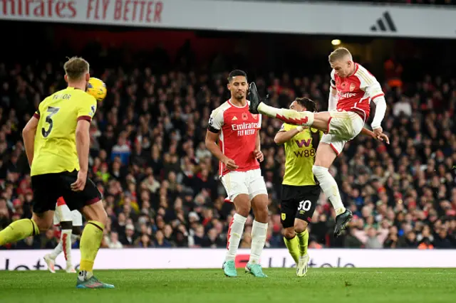Oleksandr Zinchenko shoots with a scissor-kick