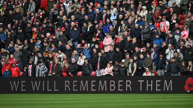 Sunderland fans observe a minute's silence at the Stadium of Light