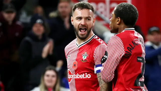 Adam Armstrong celebrates giving Southampton the lead over West Brom