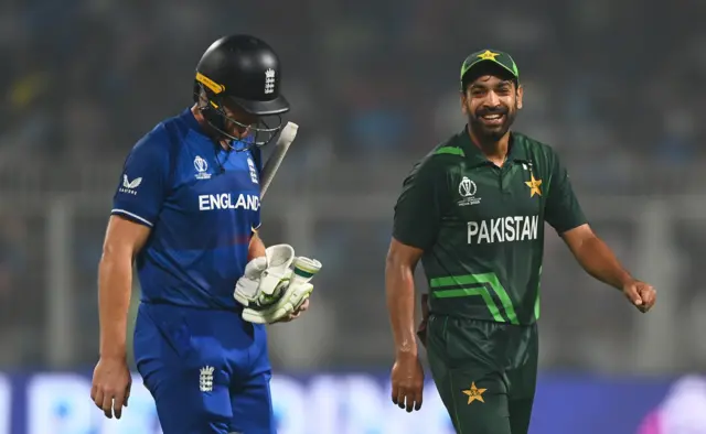 Haris Rauf laughs as Jos Buttler walks off