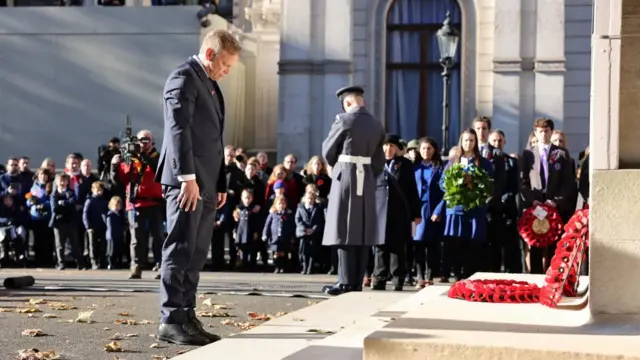 British Secretary of State for Defence Grant Shapps lays a wreath at the annual ceremony in Remembrance