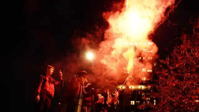 People set off fireworks