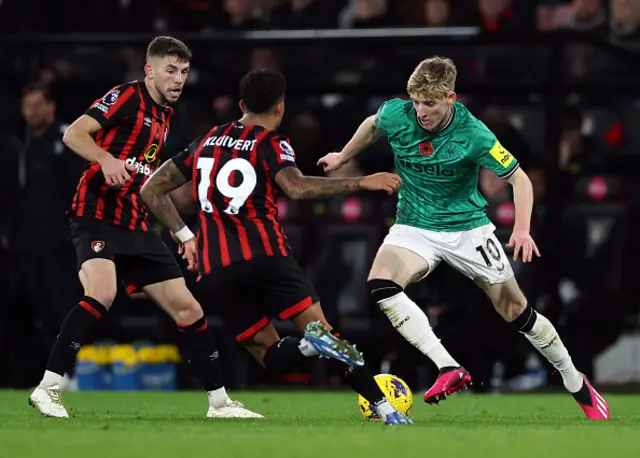 Anthony Gordon under pressure from Bournemouth players