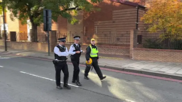 Sir Mark Rowley alongside colleagues near the US embassy in Nine Elms, near Vauxhall, central London