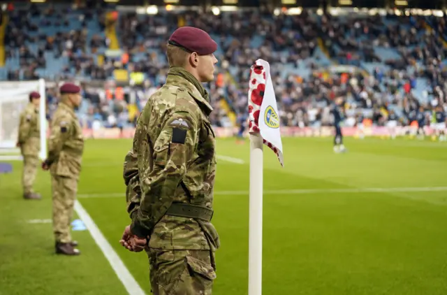 A member of the armed forces lines up at Elland Road