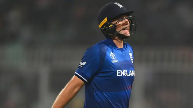 Joe Root walks off