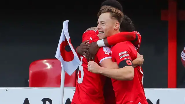 Daniel Kemp celebrates scoring for Swindon against Stockport