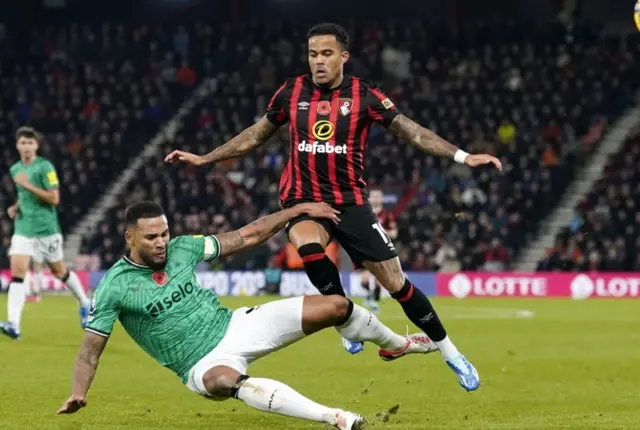 Jamaal Lascelles and Bournemouth's Justin Kluivert battle for the ball