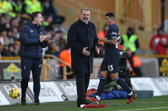 Ange Postecoglou looks on from the touchline