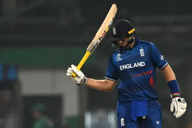Joe Root celebrates his half-century