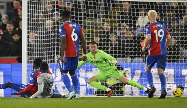 Idrissa Gueye watches has the ball goes past Tom Johnstone