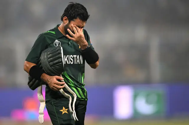 Muhammad Rizwan walks off after being dismissed