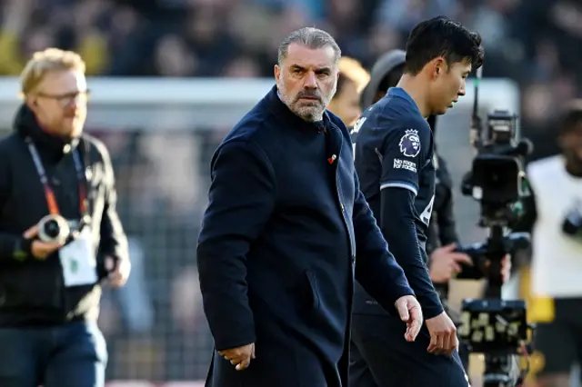 Ange Postecoglou looks on