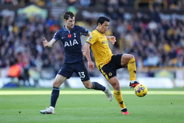 Ben Davies and Hwang Hee-Chan