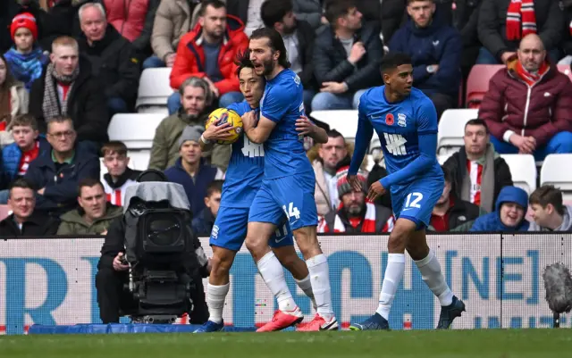 Koji Miyoshi celebrates his equalising goal