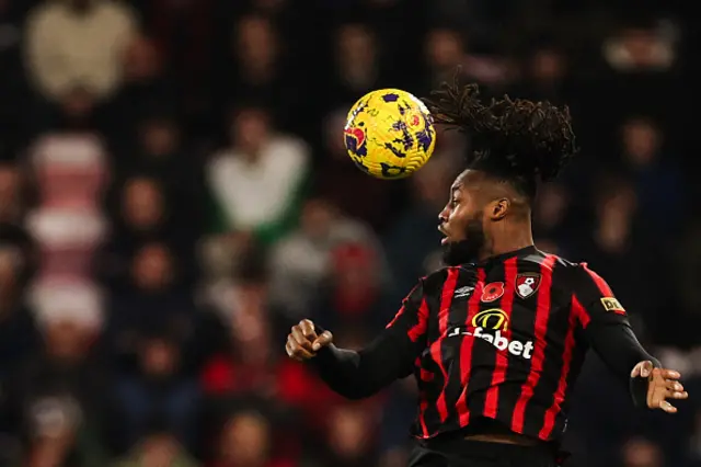 Antoine Semenyo heads the ball
